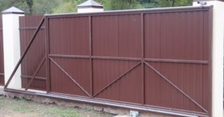 Купить откатные ворота из профнастила Кушва, цена от 1738 руб.